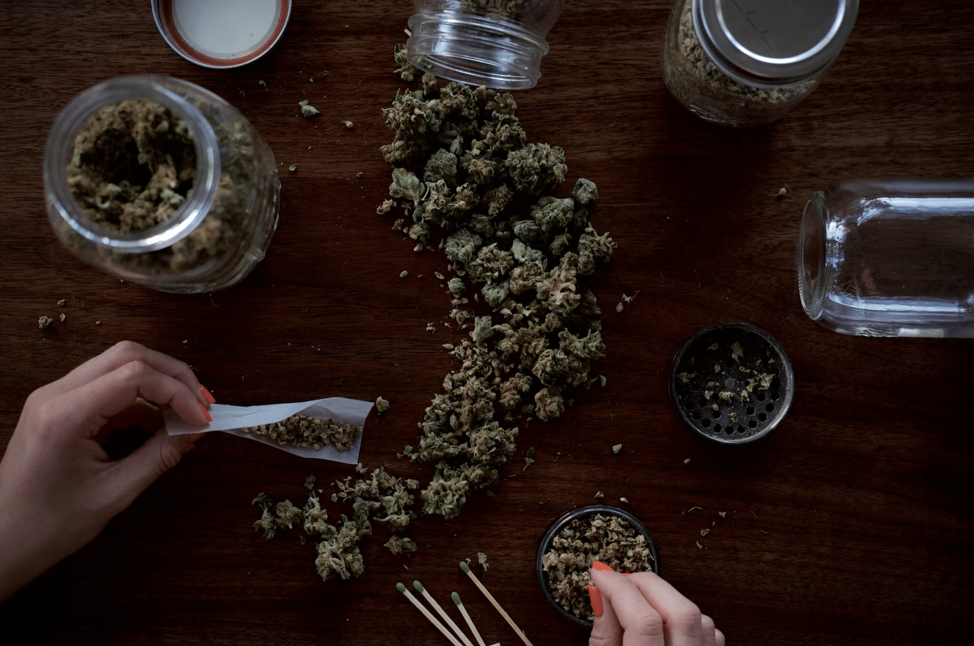 Man mixing marijuana strains